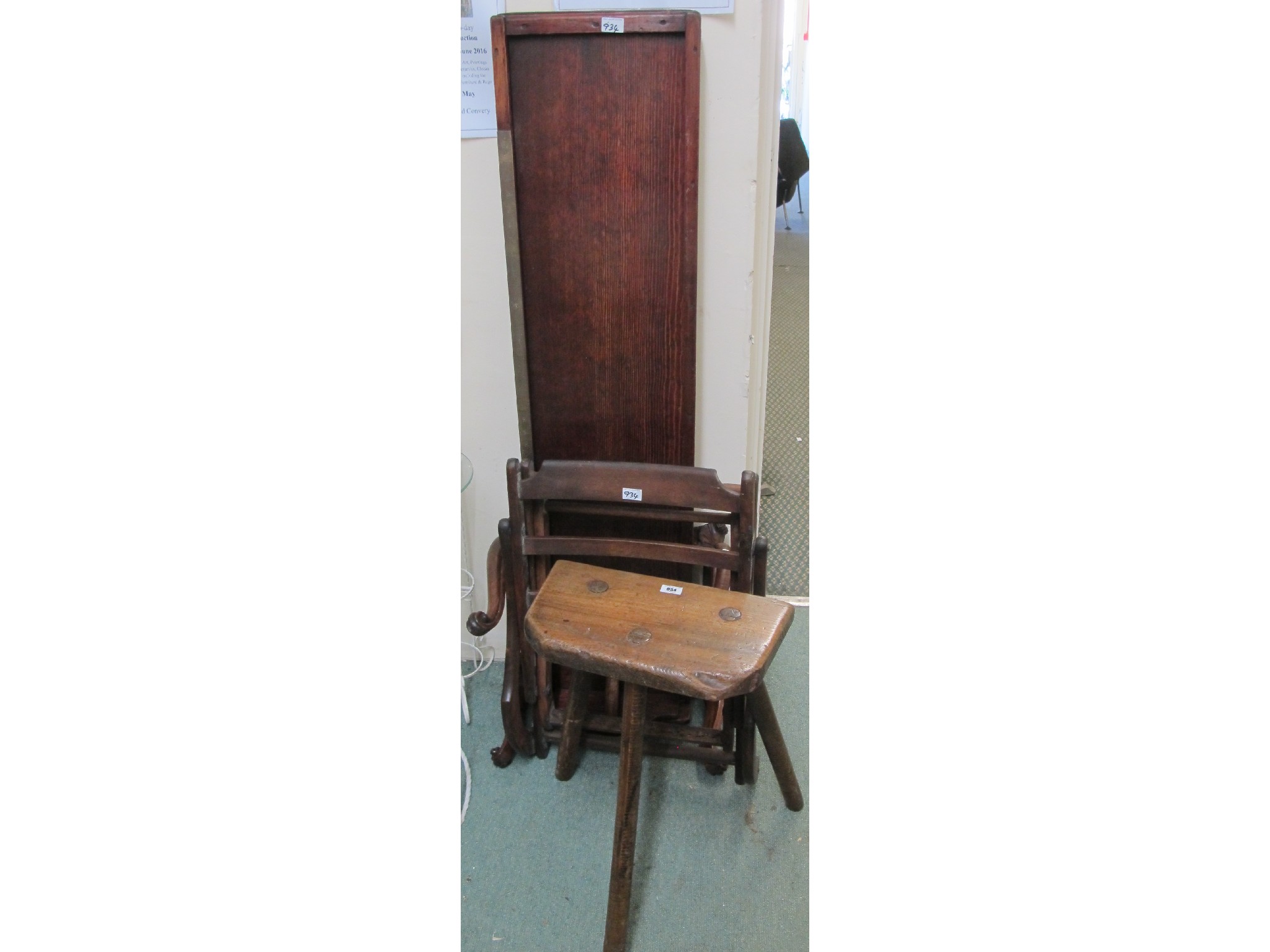 Appraisal: A three legged stool campaign chair def footstool def and