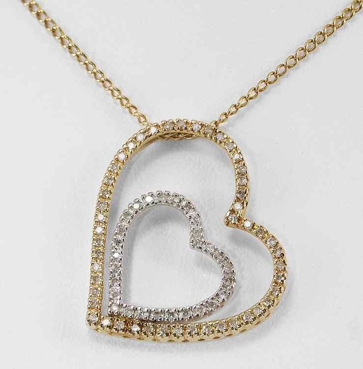 Appraisal: K DIAMOND DOUBLE HEART NECKLACE K yellow and white gold