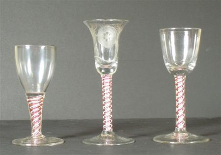 Appraisal: Jacobite Interest A red and white airtwist stem glass with