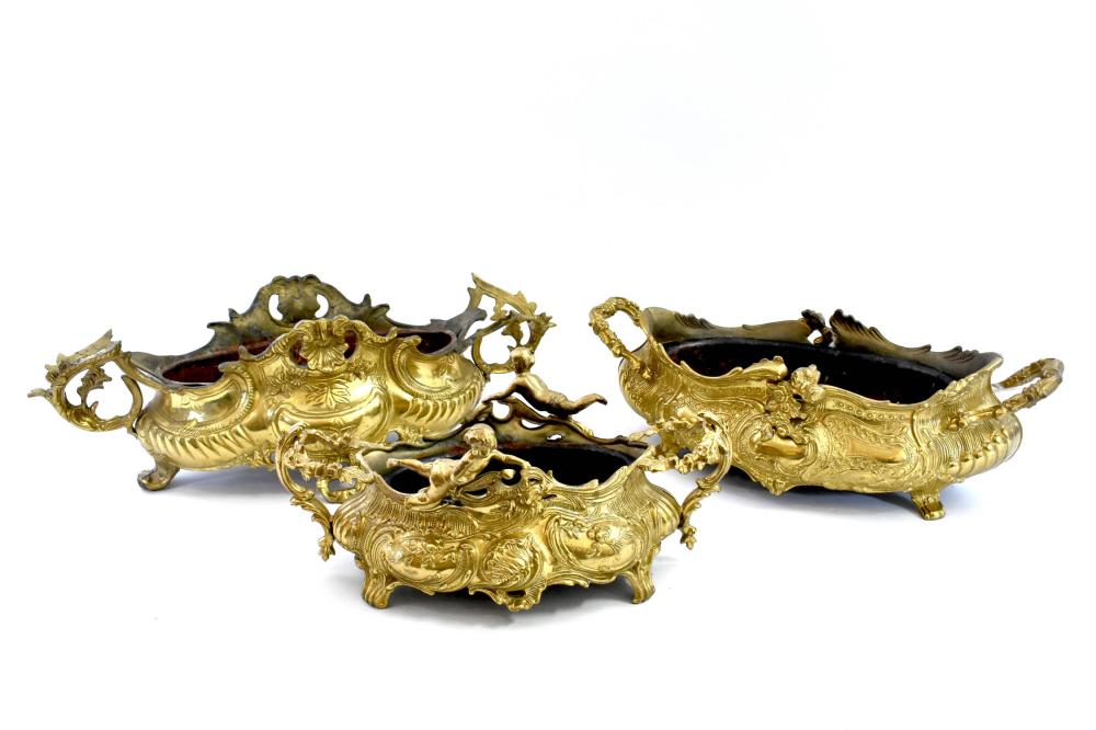 Appraisal: THREE FRENCH ROCOCO STYLE GILT BRONZE JARDINIERSFirst Half th Century