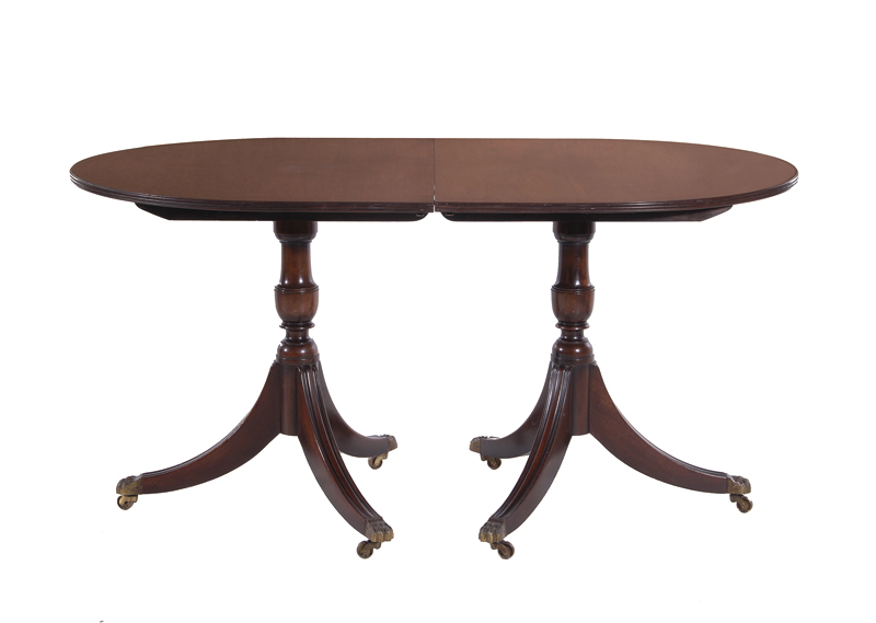 Appraisal: Diminutive mahogany two-pedestal dining table H W L Provenance North