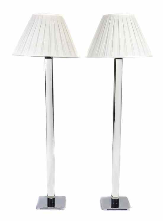 Appraisal: A Pair of Chrome and Lucite Floor Lamps Carotto Designs