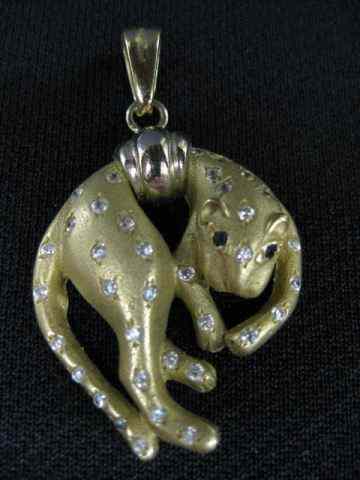 Appraisal: k Figural Leopard Pendant diamonds throughout sapphire eyes Italian ''