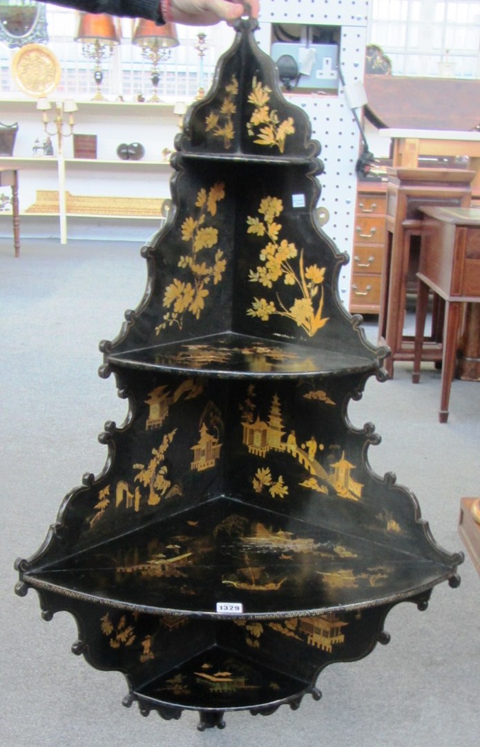 Appraisal: An early th century black lacquer gilt decorated graduated four