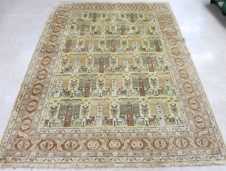 Appraisal: HAND KNOTTED ORIENTAL CARPET Indo-Persian repeating pictorial band design on