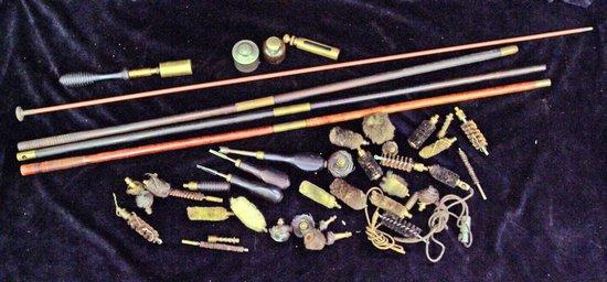 Appraisal: A quantity of gun cleaning apparatus including rods a brass