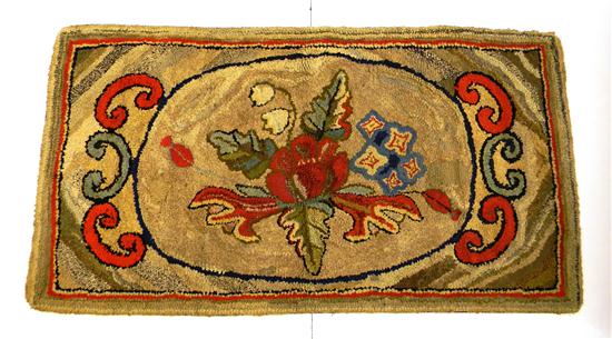 Appraisal: American victorian hooked rug with a floral medallion ' ''