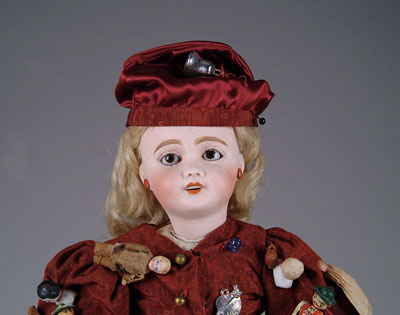 Appraisal: BISQUE-HEADED PEDDLER DOLL What a charming doll A collaboration of