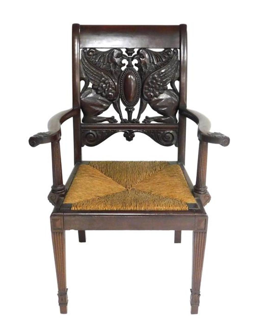 Appraisal: Armchair with ornate carved griffin splat c mahogany straight crest