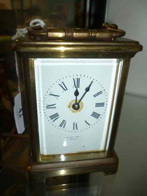 Appraisal: A BRASS CASED CARRIAGE TIMEPIECE