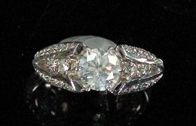 Appraisal: Fourteen-Karat White Gold and Diamond Engagement Ring composed of a