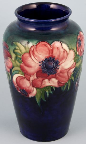 Appraisal: th Century English Moorcroft vase having floral motif h Good