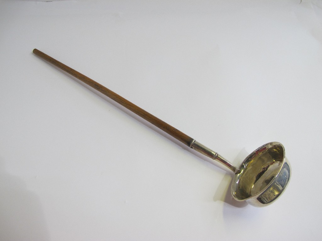 Appraisal: A silver bowled toddy ladle marked