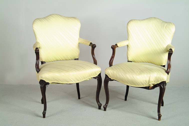 Appraisal: PAIR OF ENGLISH OPEN UPHOLSTERED ARMCHAIRS IN THE FRENCH MANOR