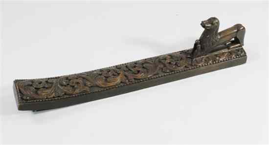 Appraisal: A fine mangling board Norwegian th century carved with scrolling