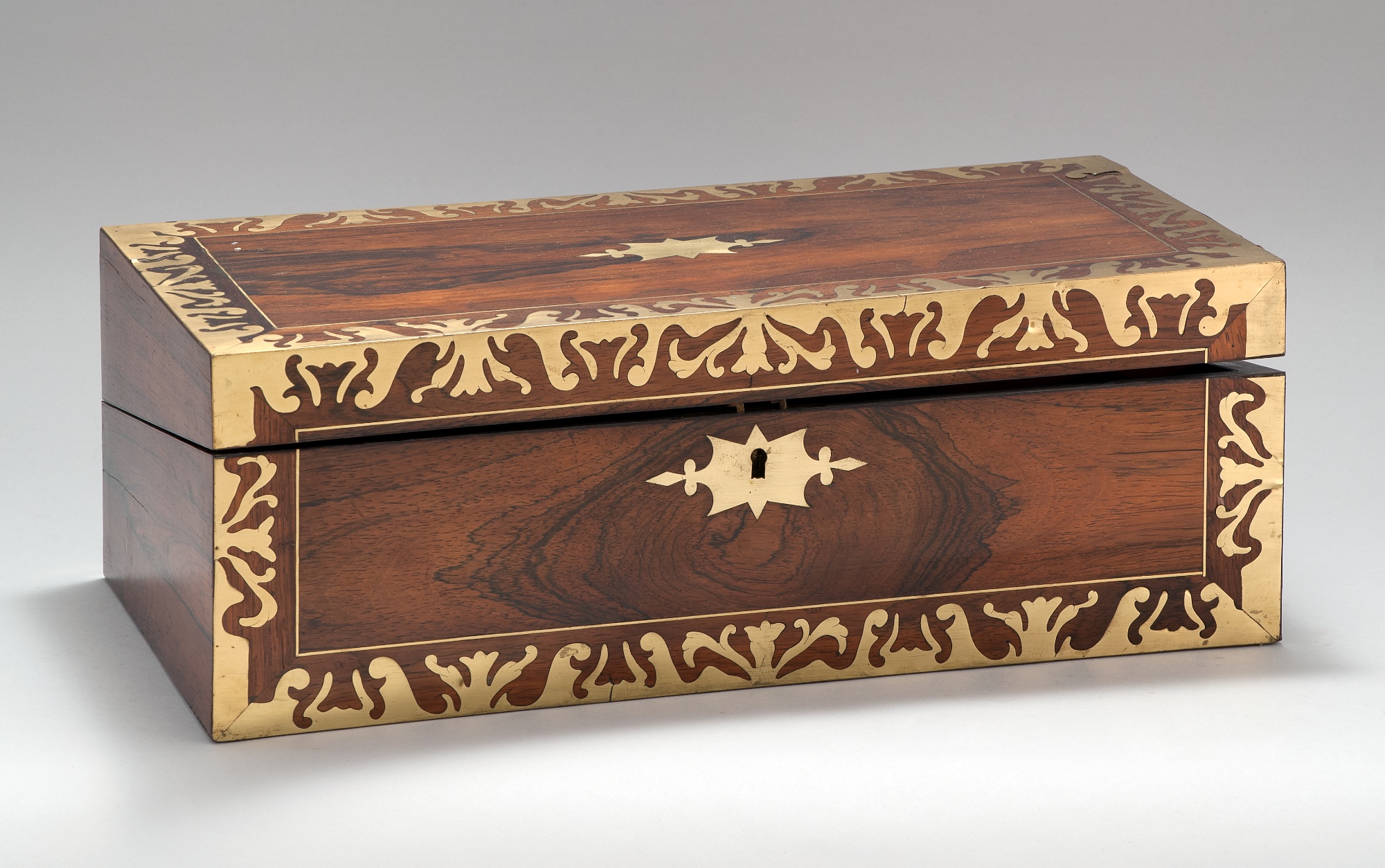 Appraisal: CIRCA ENGLISH LAP DESK in rosewood with foliate brass overlay