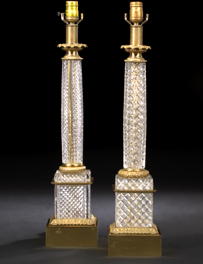 Appraisal: Near-Pair of French Empire-Style Brilliant-Cut Glass and Gilt-Brass Lamps modeled