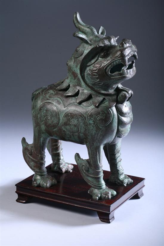 Appraisal: CHINESE BRONZE QILIN-FORM CENSER Hinged head verdigris and brown patina