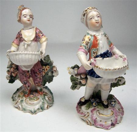 Appraisal: A pair of late th century Derby figural salts the