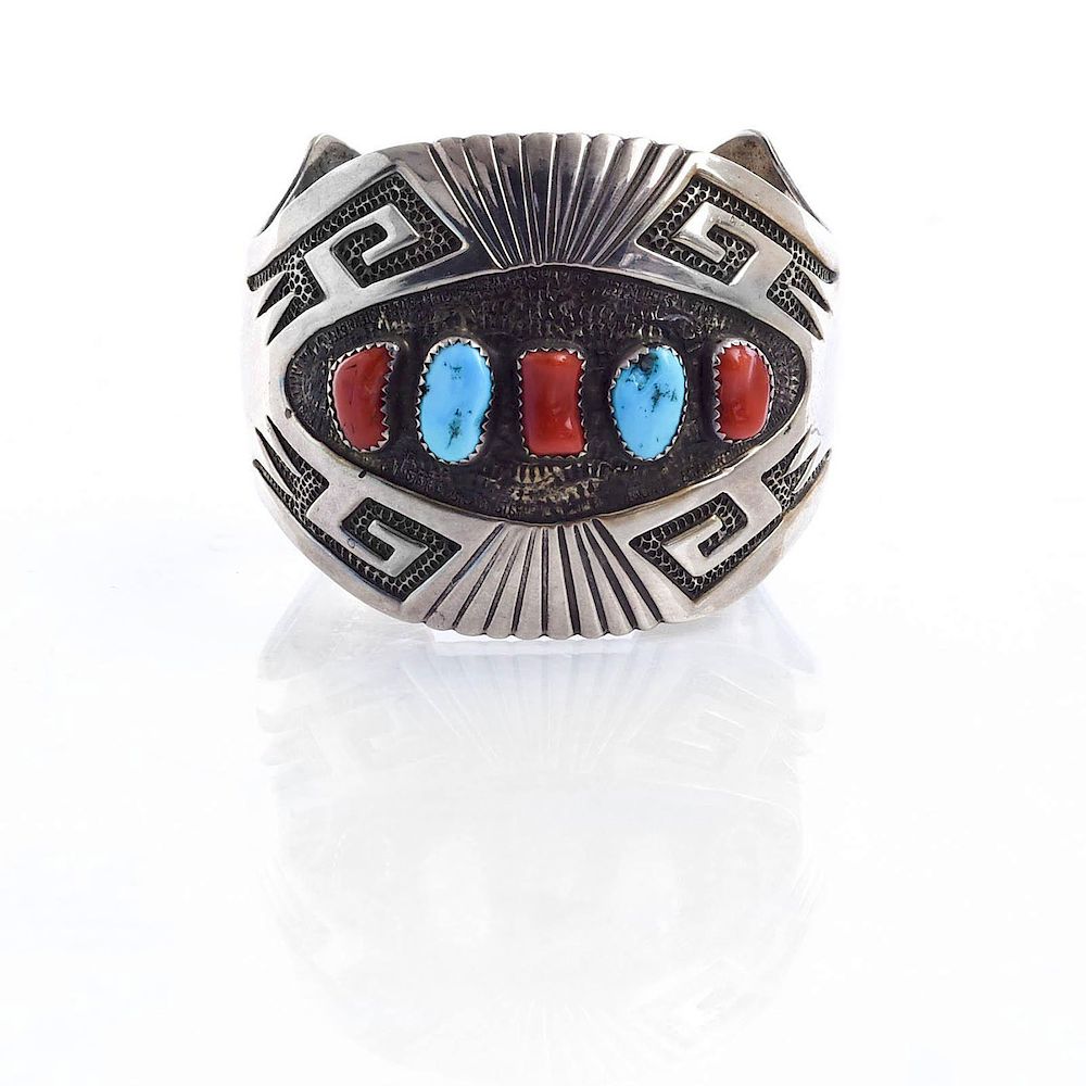 Appraisal: GILBERT ADAKAI NAVAJO STERLING SILVER BRACELET Cuff bracelet with inset