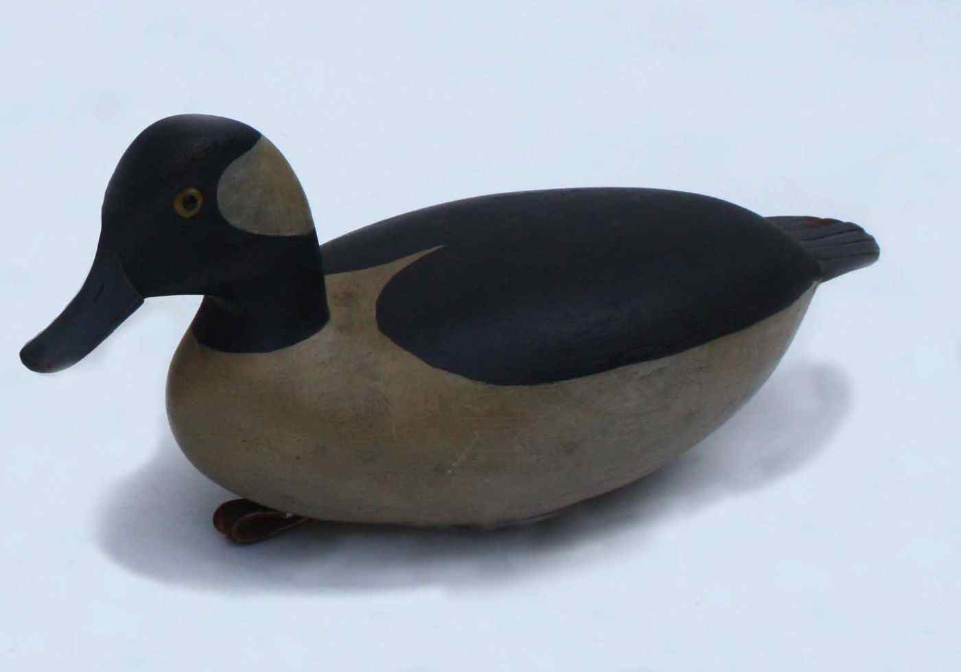 Appraisal: BUFFLEHEAD DRAKE DECOYHollow-carved with glass eyes and carved tail Stamped