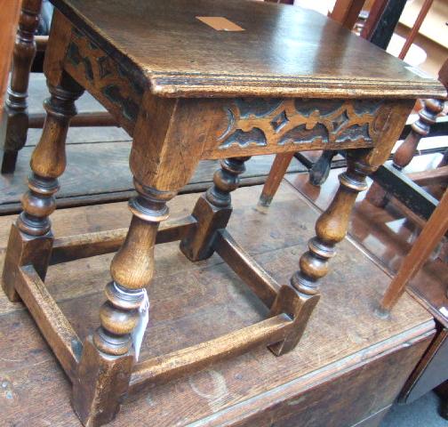 Appraisal: Two oak joint stools each with a carved frieze