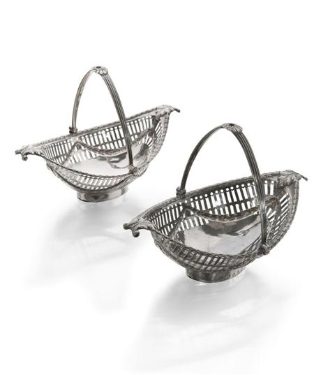 Appraisal: A pair of George III swing handled small baskets by