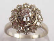 Appraisal: A French hallmarked carat white gold diamond cluster ring the