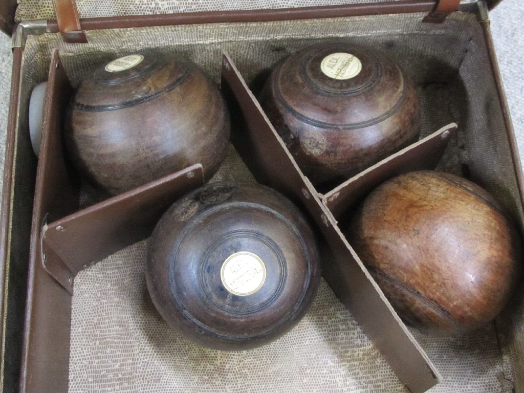 Appraisal: Lot comprising two sets of lawn bowls in cases