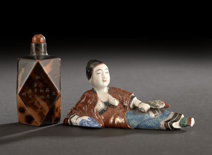 Appraisal: Two Chinese Snuff Bottles composed of a molded porcelain bottle