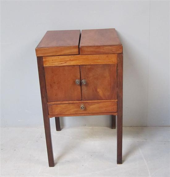 Appraisal: George III mahogany wash stand with a folding top above