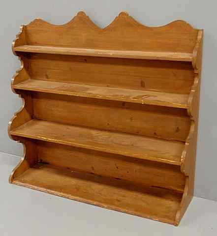 Appraisal: Pine hanging shelf with scalloped sides h x w x