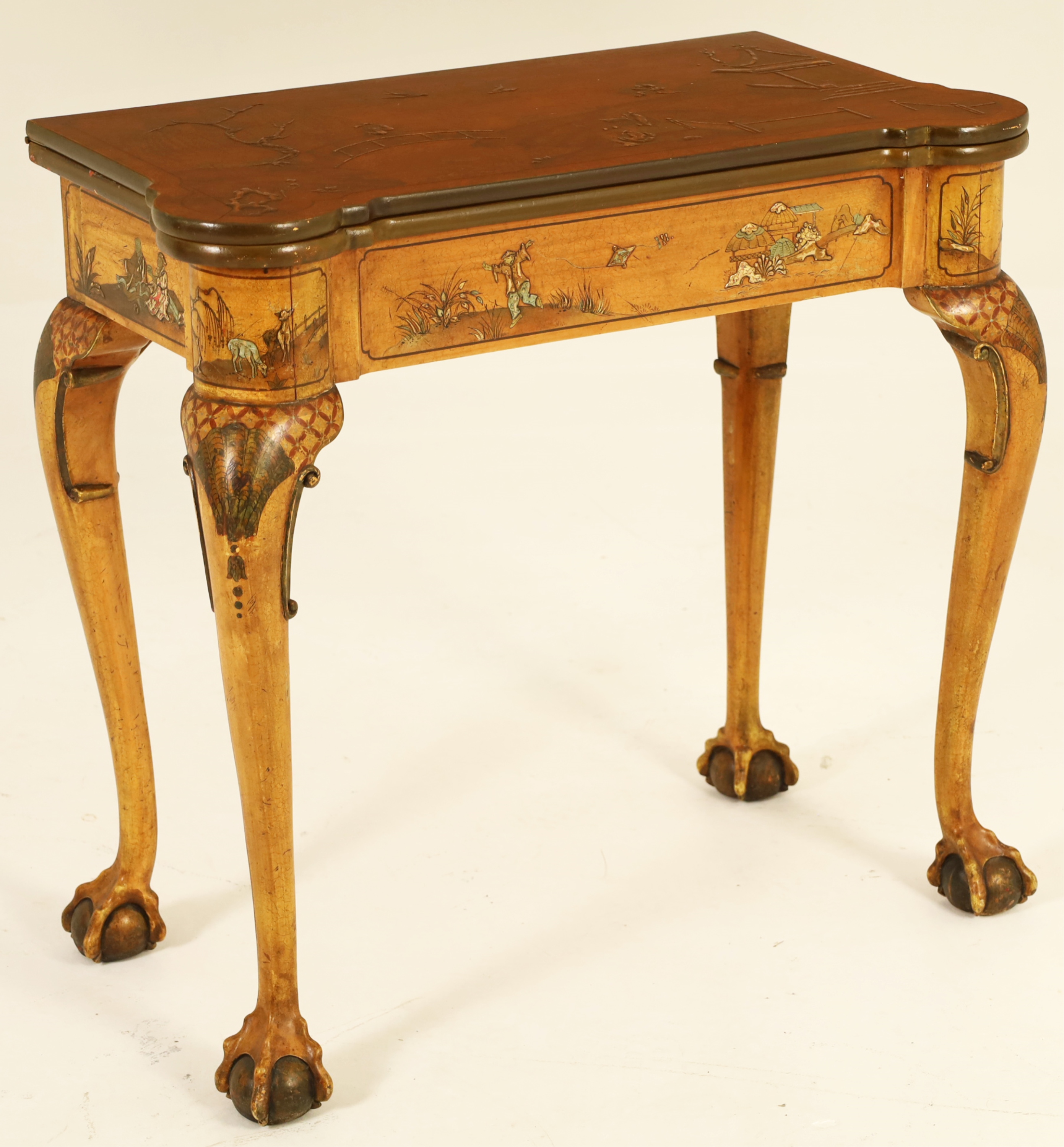 Appraisal: DECORATIVE ENGLISH POLYCHROME GAMES TABLE Decorative English two tone style