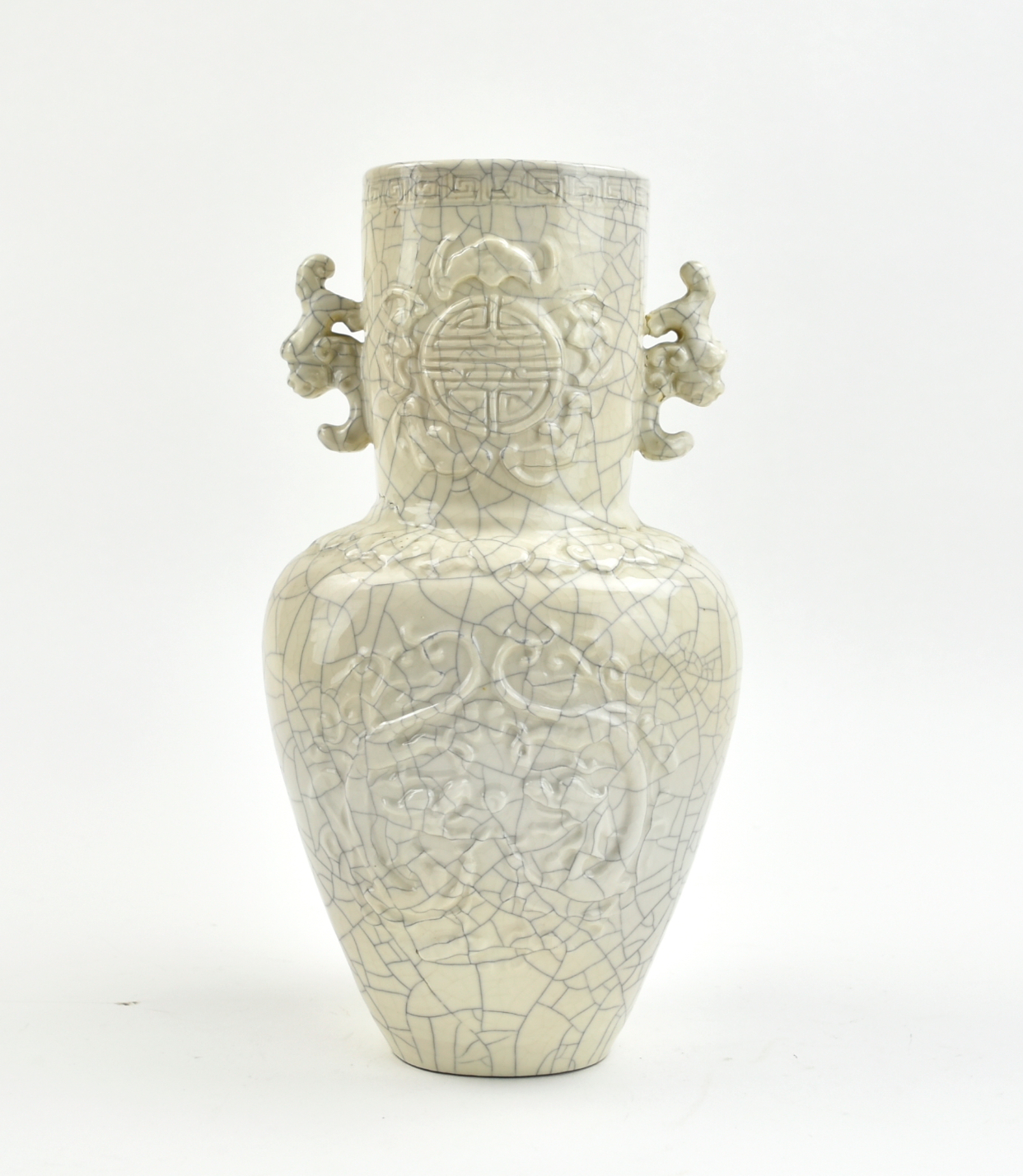 Appraisal: of faceted baluster-form with a pair of stylised dragon handles