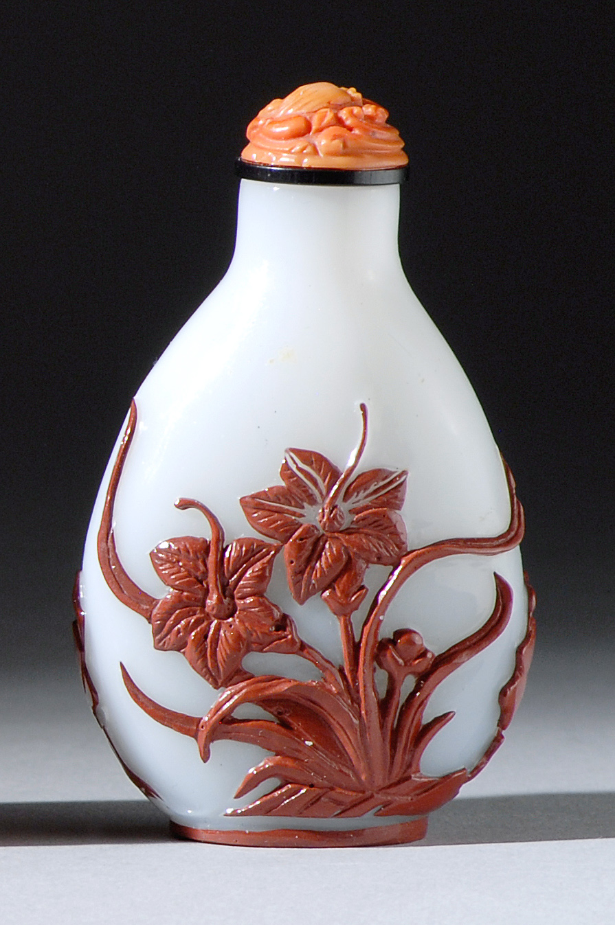 Appraisal: OVERLAY GLASS SNUFF BOTTLE In pear shape with rust-red depiction