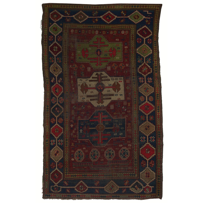 Appraisal: Caucasian Kazak rug c stylized floral design on a red