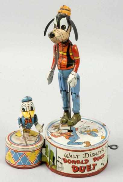 Appraisal: Tin Litho Marx Donald Duck Duet Wind-Up Toy Description American