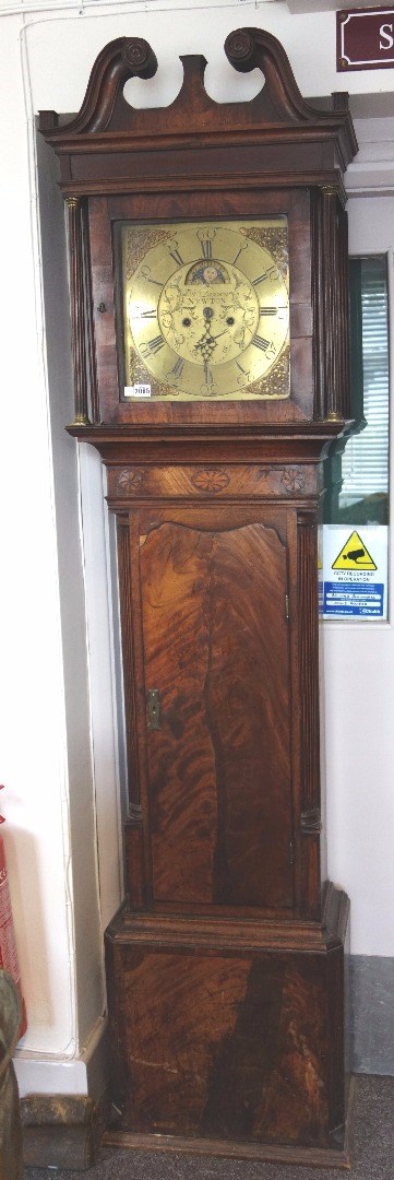 Appraisal: A mahogany cased longcase clock th century with broken arched