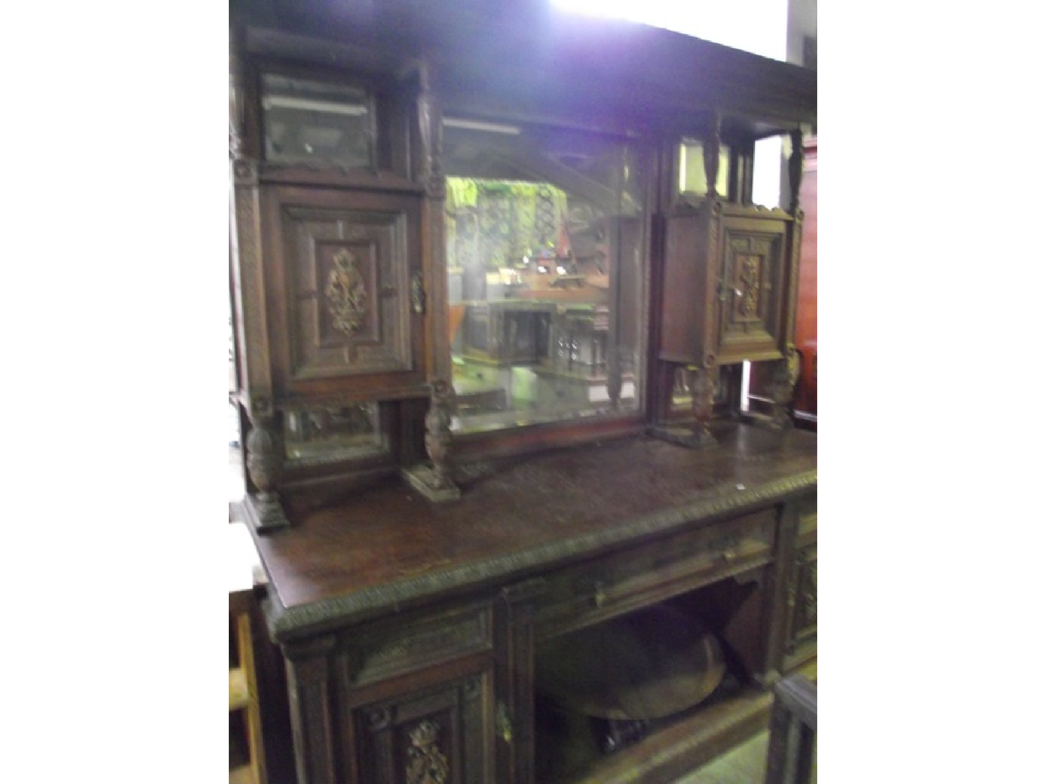 Appraisal: A substantial late Victorian oak mirror back sideboard the base