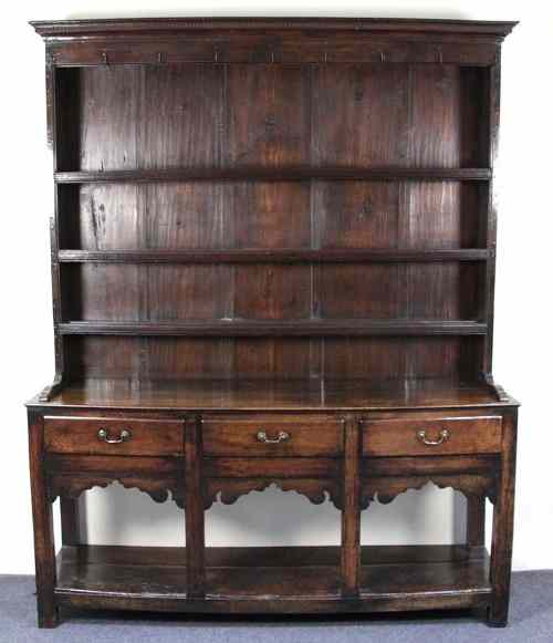 Appraisal: An early th Century oak dresser the three-shelf rack above