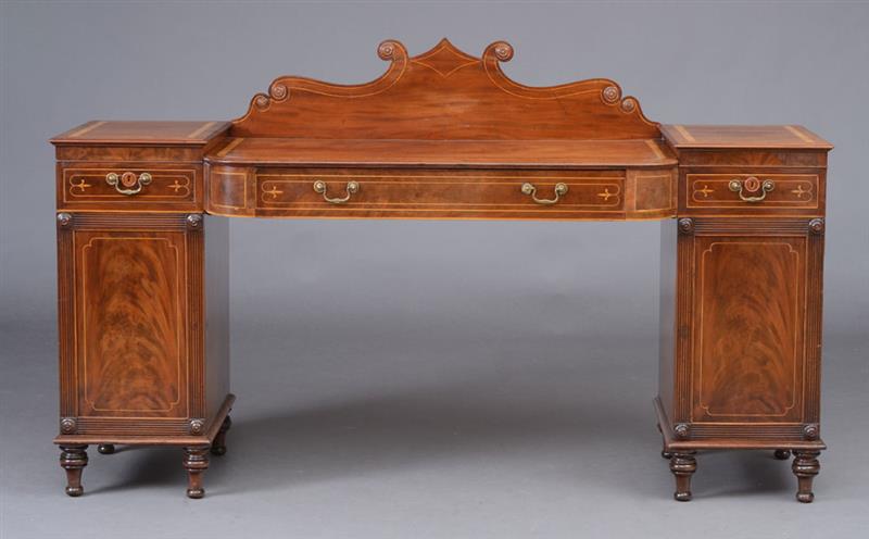 Appraisal: Late Regency Mahogany Pedestal Sideboard Fitted with three drawers and