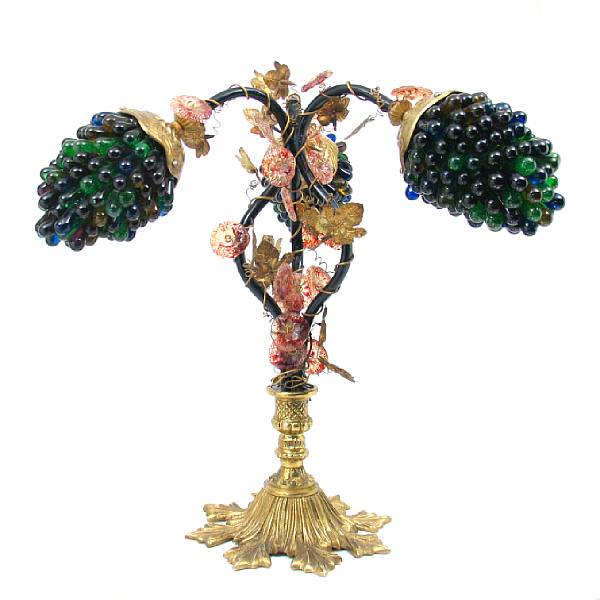 Appraisal: A gilt-metal and colored glass three-light table lamp first quarter