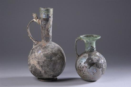 Appraisal: TWO ROMAN IRIDESCENT GLASS JUGS Circa AD Each with a