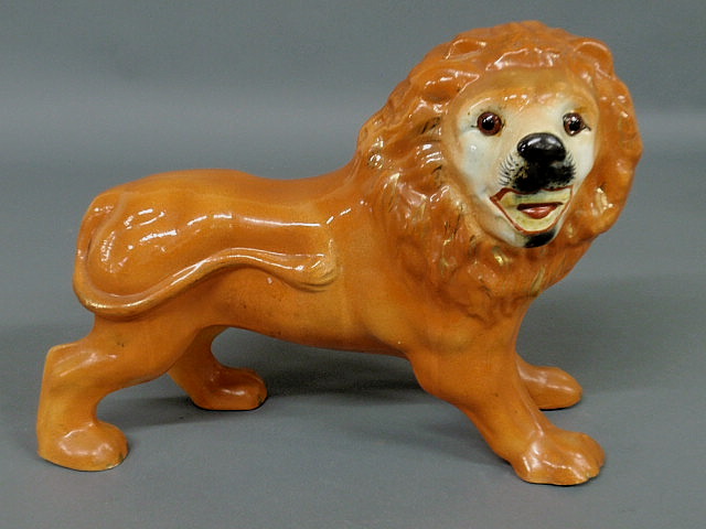 Appraisal: English Staffordshire standing lion c h x l x d