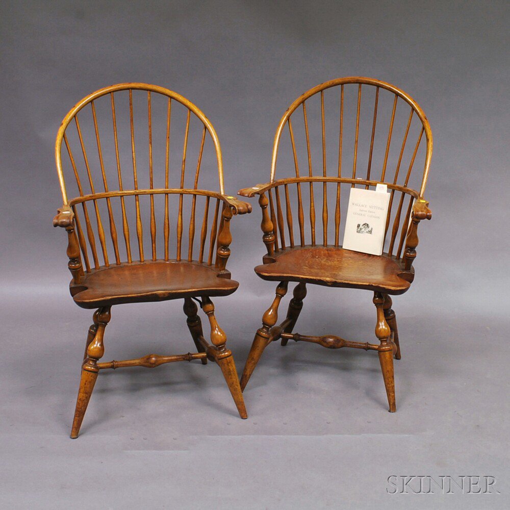 Appraisal: Pair of Wallace Nutting Sack-back Windsor Chairs with shaped handholds