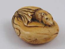 Appraisal: An antique ivory netsuke of a rat with inset eyes