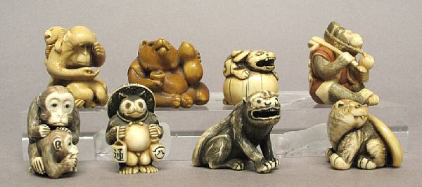 Appraisal: A group of eight carved ivory animal netsuke th and