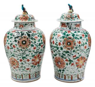 Appraisal: A Pair of Wucai Porcelain Jars and Covers A Pair