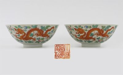 Appraisal: A pair of Chinese famille rose bowls brightly enamelled with