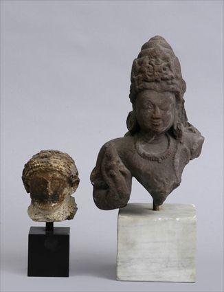 Appraisal: INDIAN CARVED SANDSTONE HEAD OF A TEMPLE DANCER AND A